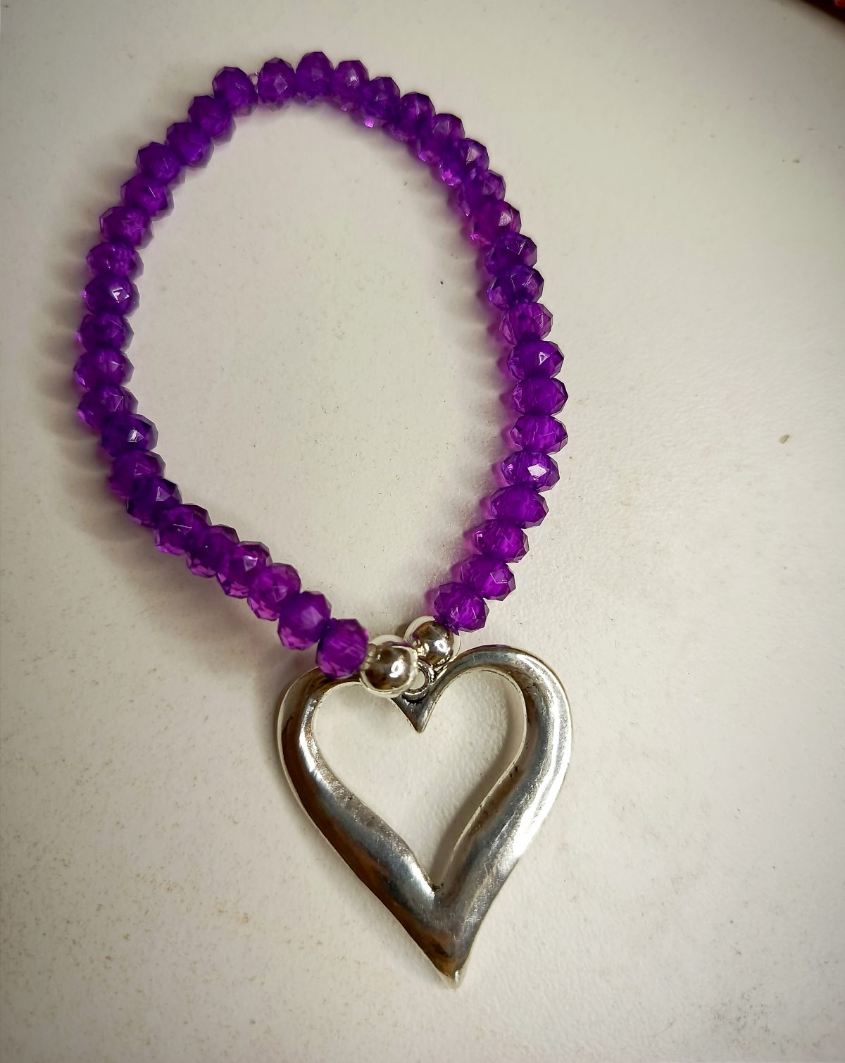 Pulsera elástica violeta