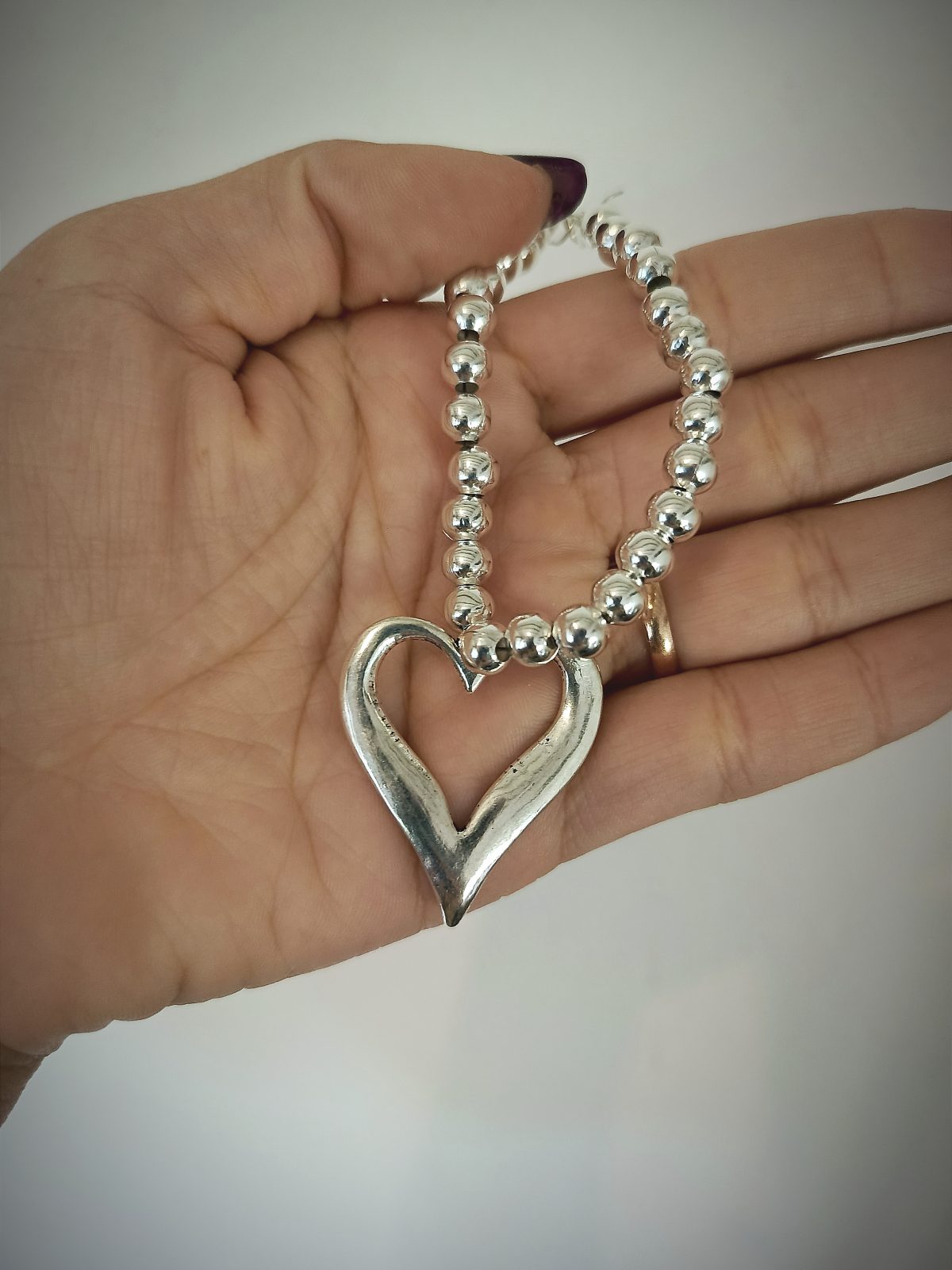 Pulsera corazón plateado